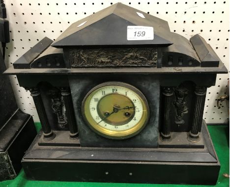 A 19th Century French black slate cased marble clock of architectural form, the eight-day movement by Japy Frères of Paris, N