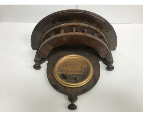 A mahogany wall shelf of demi-lune form with gilt set roundel decorated with ducks amongst bullrushes, 39 cm wide x 19 cm dee
