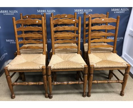 A set of six oak framed rush seat ladder back chairs in the 17th Century North Country manner, 50 cm wide x 41 cm deep x 99 c