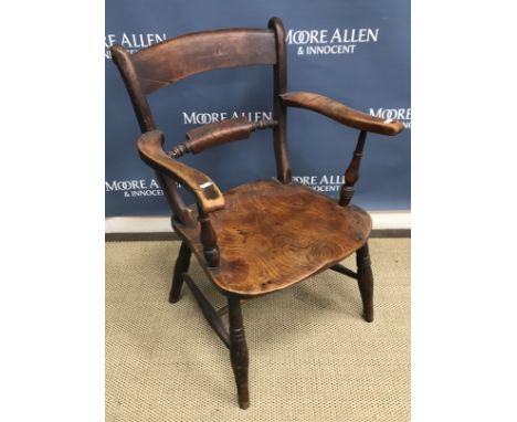 A 19th Century beech and elm Oxford bar back elbow chair, four 19th Century ash rush seat ladder back chairs, three Edwardian