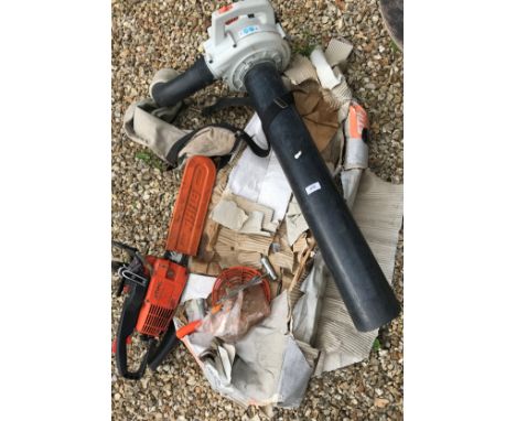 A Stihl 010AV Electronic Quick Stop petrol driven chainsaw, together with a Stihl BG75 petrol driven leaf blower