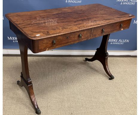 A 19th Century Irish mahogany sofa table, the rectangular top with moulded edge above two frieze drawers, the left stamped "G