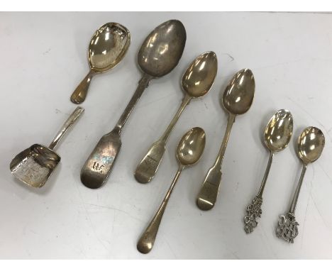 A collection of various cutlery and small silver wares to include a set of six silver teaspoons, three various commemorative 