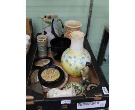 A SHELF FULL OF DOMESTIC POTTERY & PORCELAIN to include, pot lids, Irish figurines etc., tall yellow vase has been broken & r