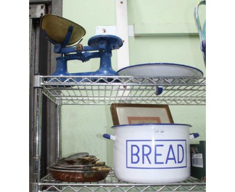 A SELECTION OF KITCHEN COPPER PANS with brass handles, together with a large enamelled bread crock, two decorative prints of 