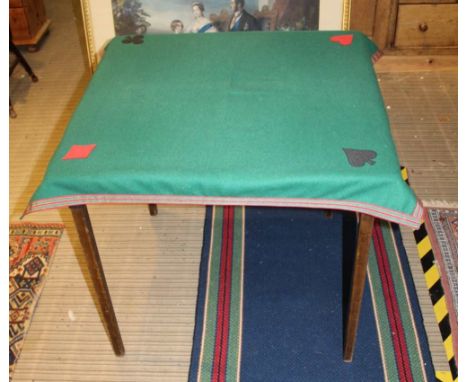 A BAIZE TOP FOLDING CARD TABLE with extra loose cover 