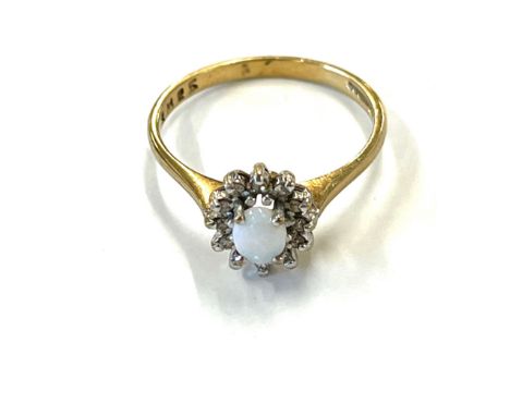 9ct gold opal and diamond halo ring, approximate weight 2g 