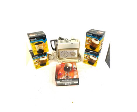 Vintage Goblin teasmaid with a selection of coffee magic mugs 