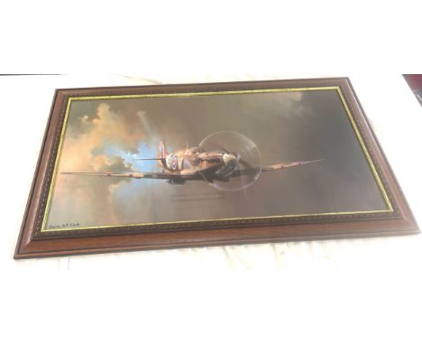 Framed print of a Spitfire by Barrie A F Clark, approximate measurements: Height 11 inches, Width 40 inches 