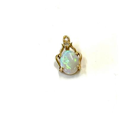 9ct gold opal and diamond pendant, approximate weight 0.8g 