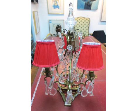 TABLE LAMP, Continental brass with glass droplets and three red shades, 58cm H x 36cm W. 