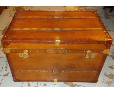 STEAMER TRUNK, brown leather and brass bound with hinged top, 52cm H x 81cm W x 51cm D. 