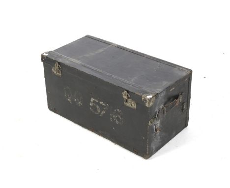 A vintage car trunk. Covered in black oilcloth with twin leather handles, metal bandings and corners, marked 'OQ 5715' and wi