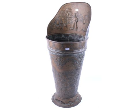 A vintage Dutch copper coal scuttle. With embossed decoration, of tapering cylindrical form on a flared circular base. H83cm