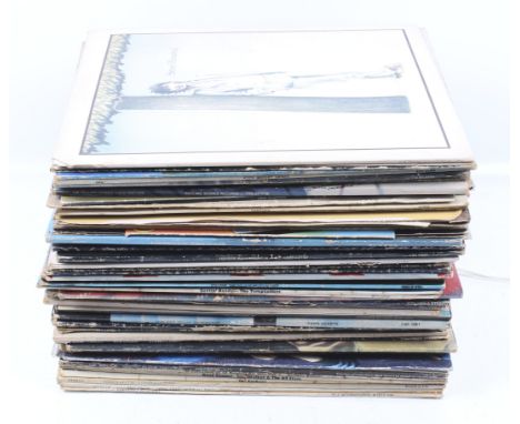 A collection of vintage vinyl. Including Bruce Springsteen, Led Zeppelin, Elton John, Pink Floyd, The Beatles, etc. The major