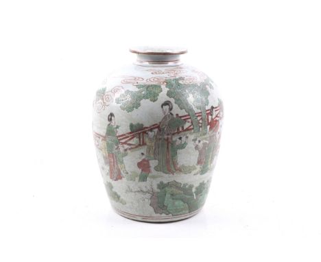 A large Chinese wine vessel. With everted lip rim, the body with famille verte decoration of women and children in a garden. 