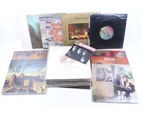 A quantity of assorted rock and pop Vinyl records. To include The Rolling Stones (Stone Age), Rainbow, Deep Purple (Made in J