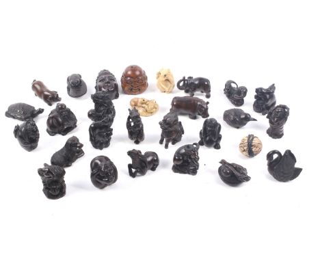 A collection of 28 modern Japanese netsuke. Comprising a variety of wood and resin animals and mythological figures. Largest 