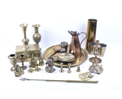A collection of assorted metalware. Including trench art shell case, copper candlestick, brass tray, etc. Max. H29cm