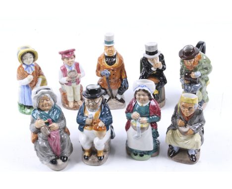 Eight Arthur Wood and Charles Dickens Toby Jugs. Including 'Fagin', 'Scrooge', 'Mrs Gamp', etc. Max. H16cm