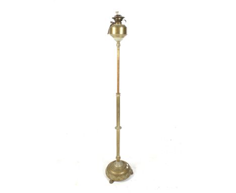 A Victorian Hink's London Duplex brass oil lamp. With a ribbed stand, mounted on a circular base, Reg. No.97643, H177cm