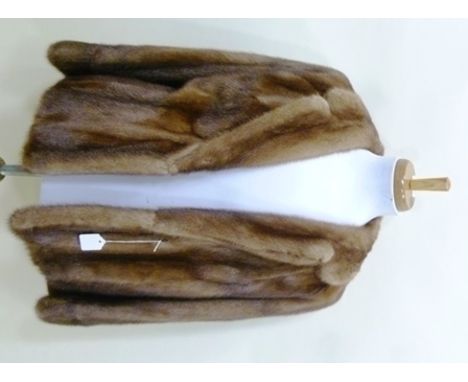 A LIGHT BROWN MINK BOLERO/SHORT JACKET, approximately size 14 