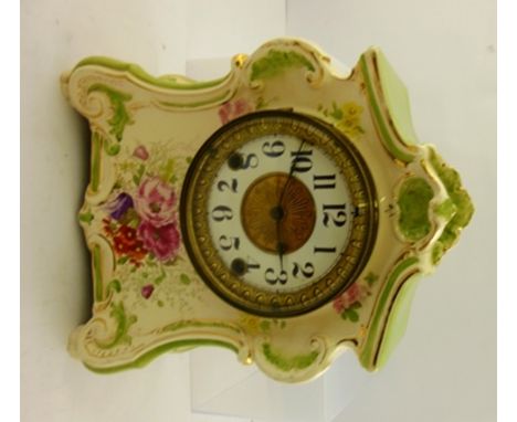 A ROYAL BONN POTTERY CASED MANTEL CLOCK with Ansonia New York movement, floral decoration on a white and apple green ground, 
