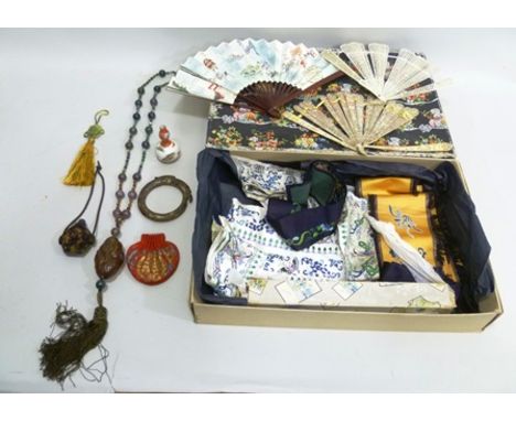 A "MARSHALL & SNELGROVE" CARD BOX CONTAINING A VARIETY OF COLLECTABLE ITEMS to include; hand embroidered Chinese silks, fans,