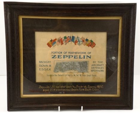 A FRAMED PORTION OF A ZEPPELIN brought down in Essex by the Aircraft Defences September 23/24, 1916. Sold for the benefit of 