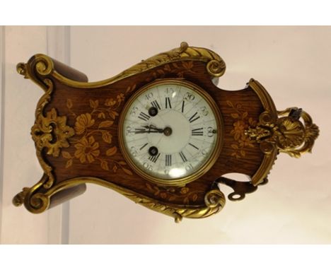 A LATE 19TH/EARLY 20TH CENTURY FRENCH ORMOLU MOUNTED AND MARQUETRY BRACKET CLOCK, having Neuchatel shape case with top handle