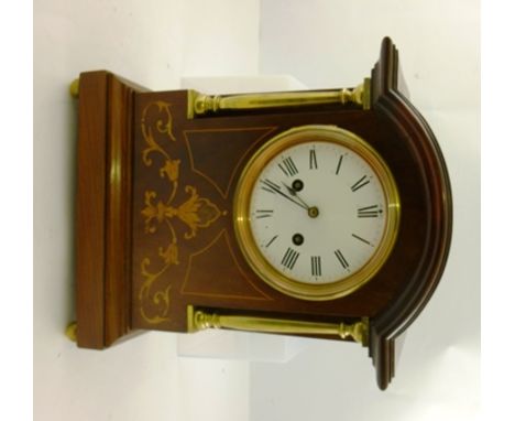 A FRENCH MAHOGANY MARQUETRY CASED MANTEL CLOCK, brass column mounted, Roman numerals, raised on ball feet, 33cm high (10cm di