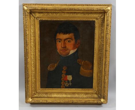 Early 19th century French School, portrait of a decorated officer, oil on canvas, indistinctly signed and dated 1814, 41cm x 