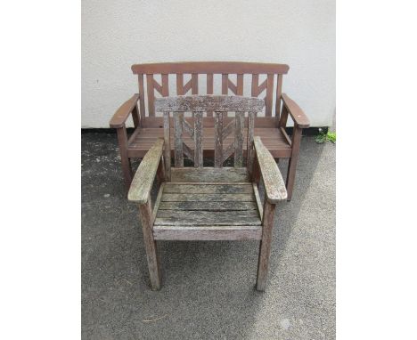 A swan Hattersley stained teak two seat garden bench with slated seat and back, 130cm wide, together with a matching chair (2