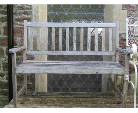 A contemporary weathered (silvered) light weight two seat wooden garden bench with slatted seat and back 