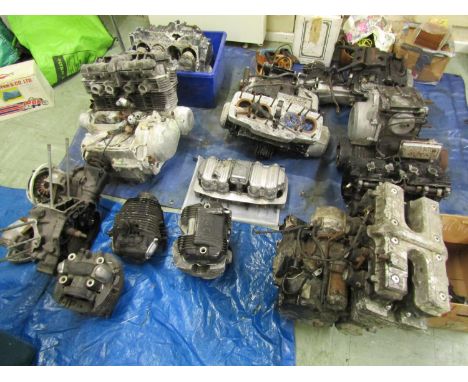 Five motorcycle engine/blocks, together with various cylinder heads etc