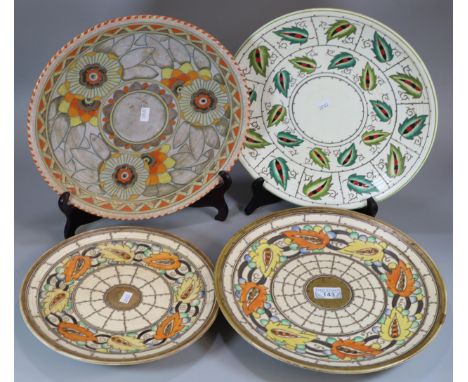 Collection of four Charlotte Rhead Art Deco design tube lined chargers.  Varying designs.  Smallest 27cm, largest 32cm diamet