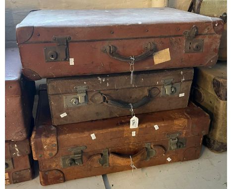 Three vintage suitcases including two in leather.  (3)  (B.P. 21% + VAT) 