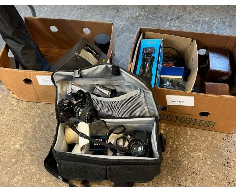Two boxes of assorted cameras and camera equipment including: folding reprographic camera, more modern compact cameras, Midas