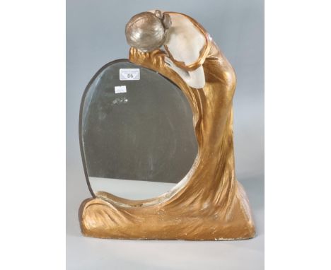 Koenig and Lengsfeld, Art Nouveau painted spelter figural mirror.  46cm high approx.  35cm wide approx.   (B.P. 21% + VAT) 