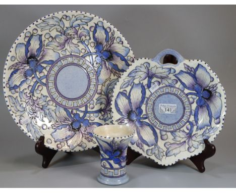 Three Charlotte Rhead Art Deco tube lined items in the 'Wind Tossed Peony' pattern to include: charger, leaf shaped dish and 