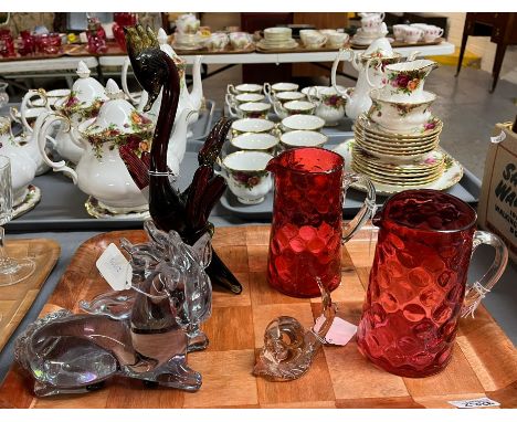 Tray of glassware to include: pair of Victorian Cranberry glass jugs, and three Art Glass animals/creatures to include: recum