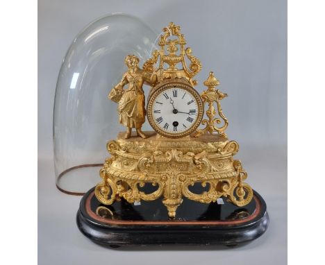 19th century French gilt spelter figural mantle clock with Roman enamel face, on an ebonised plinth under a glass dome.  43cm