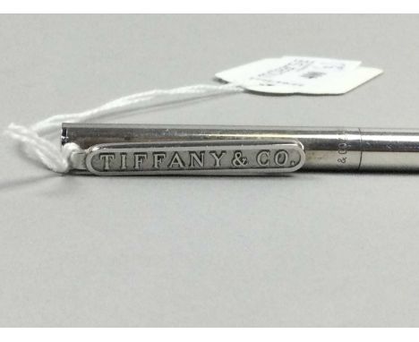 TIFFANY STERLING CASE ROLLERBALL PEN,along with a silver ingot pendant and an Art Deco style pocket watch (3)