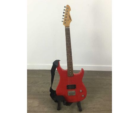 PEAVEY ELECTRIC GUITAR,in cherry red, along with a Roland Microcube amplifier (2)