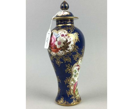 STAFFORDSHIRE BALUSTER VASE AND COVER,of Worcester design, decorated with panels and pheasants and flowers by R, Hague, on a 