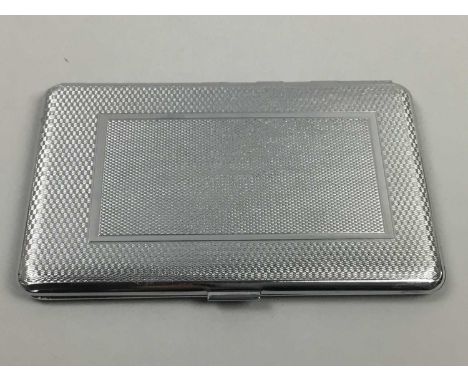 THREE CIGARETTE CASES, two with engine turned finish, along with international coinage including euros and Canadian dollars, 