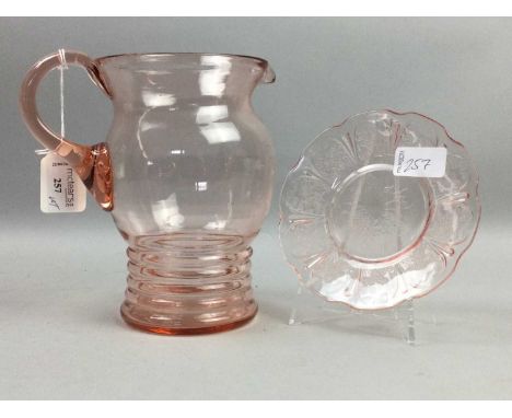 AMBER GLASS JUG AND GLASSES SET,along with a lidded jar, a similar pink glass tea service and a green glass bottle with stopp