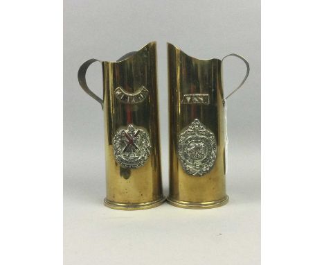 PAIR OF BRASS 'MILITARY' JUGS,each formed from a WWI military shell, with insignia in relief 'Cameron' and 'A&amp;SH', each 2