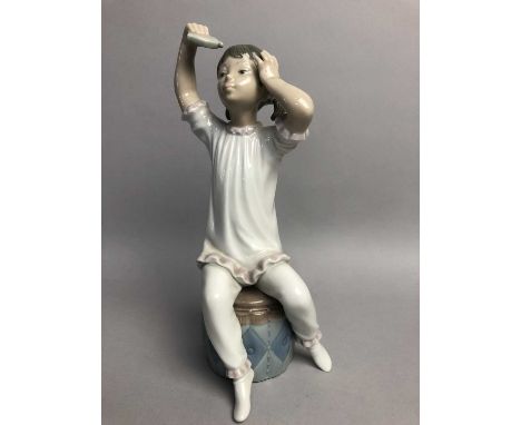 LLADRO FIGURE OF A GIRL SEATED ON A DRUM,22cm high,along with seven other Nao and other figures including clown children (8)