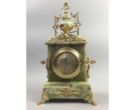 ONYX AND GILTMETAL MANTEL CLOCK OF 19TH CENTURY DESIGN,with double handled urn finial, on paw feet, 45cm high